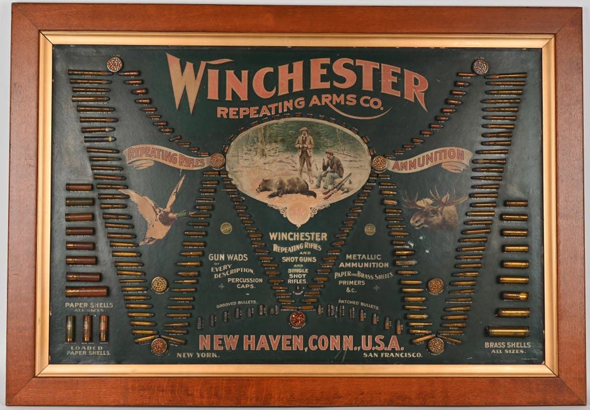 Iconic Winchester Repeating Arms Co. ‘Double W’ cartridge advertising board originating from Wilson Hardware Co., E. Main Street, Eaton, Ohio, a firm in business since 1867. Sent by Winchester in 1897 for display at Wilson’s, where it was kept for more than 120 years. Original, unrestored condition, professionally cleaned with utmost care to retain original patina on board and shells. Sold at the midpoint of its estimate range at $49,140